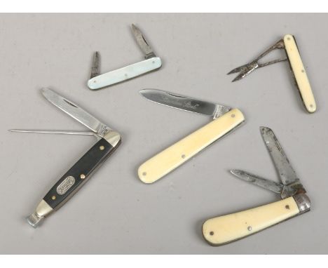 Five multi blade folding pocket knives including a Wilkinson sword, smokers knife and ivory scaled examples.