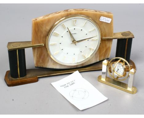 A 1950s Metamec bakelite mantle clock with associated quartz movement along with a Ulisse quartz gimbal clock.