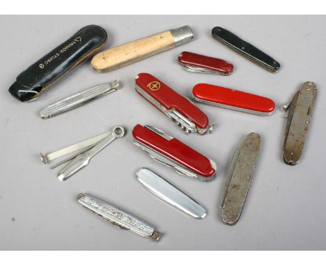 A box of various penknives and multi tools.