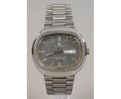 A gentlemans stainless steel Bucherer chronometer bracelet watch with date and day display and centre seconds.