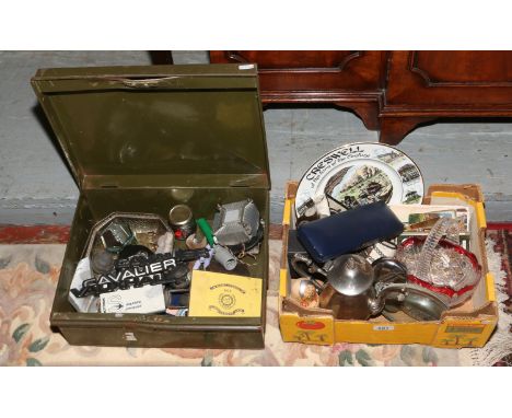 A box of collectables and green metal army box to include metalwares, cow hide belt, postcards, simulated pearls, car badges 