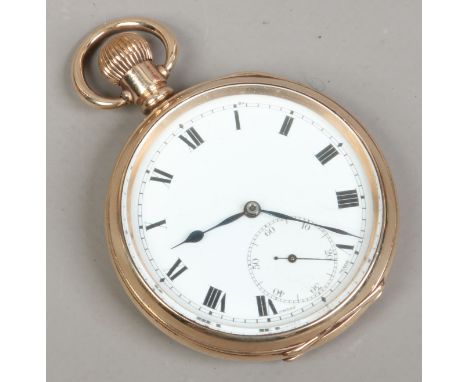 A pocket watch in rolled gold Dennison case with enamel dial and subsidiary seconds. Condition Report. To be used as a guide 