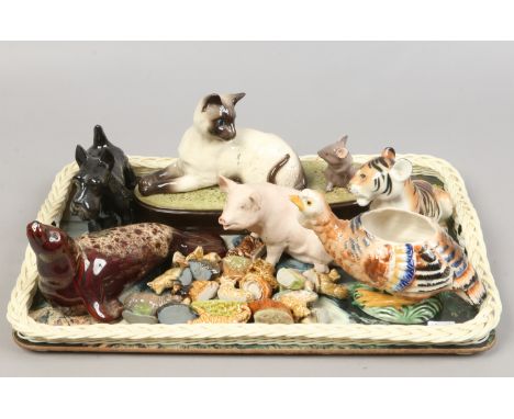 A group of ceramic animals to include Beswick, Aynsley, Wade Whimsies etc.