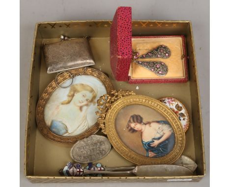 A tray of collectables and costume jewellery including portrait miniatures enamelled British Empire Exhibition spoons and col