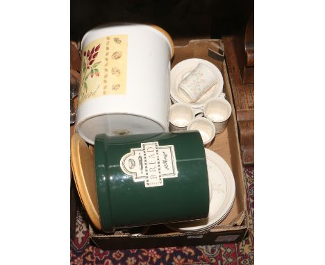 A box of Biltons dinnerwares, along with two ceramic bread crocks.