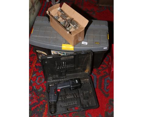 A Stanley tool box along with a quantity of drill bits and a 12 volt cordless drill (charger missing).