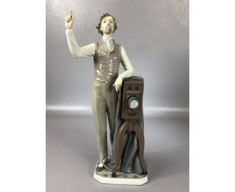Lladro ceramic figure of a photographer with a plate camera `Say Cheese`, no. 5195, approx 35cm tall