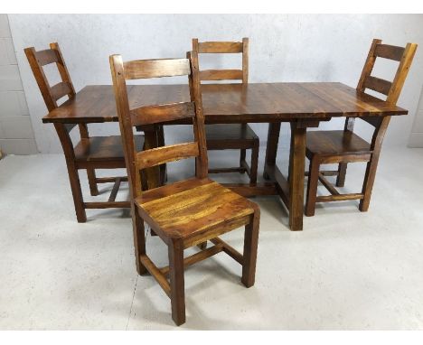 Contemporary dark wood dining table and four chairs. Table approximately 87cms x 90cms - 190cms