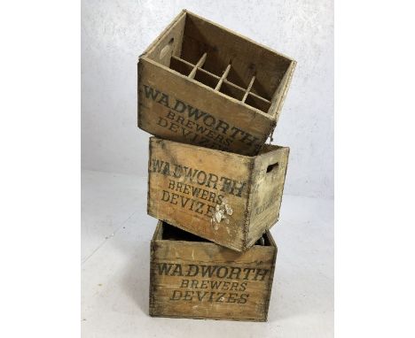 Three vintage wooden beer crates, marked 'Wadworth Brewers, Devizes', each approx 39cm x 29cm x 29cm tall