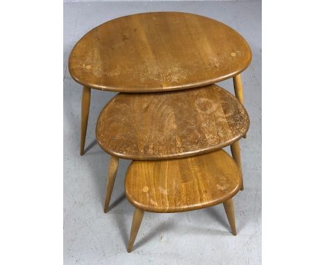 Ercol style Mid Century blonde elm 'Pebble' nest of three graduated tables, the largest approx 65cm x 44cm x 40cm tall (A/F)