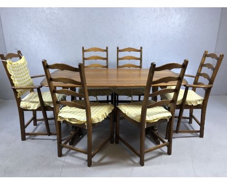 Ercol refectory style "Golden Dawn" dining table with six ladder back chairs including two carvers, table approx. 152cm x 84c