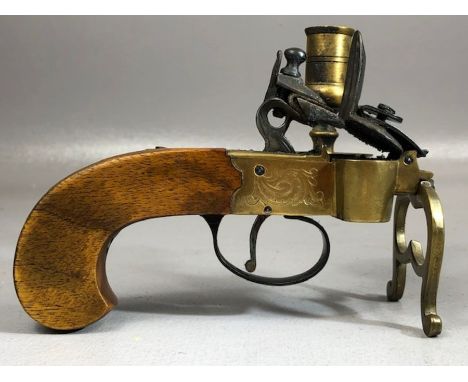 An early 19th Century brass cased Flintlock tinderbox candle lighter, half cock &amp; full cock, engraved, Good condition