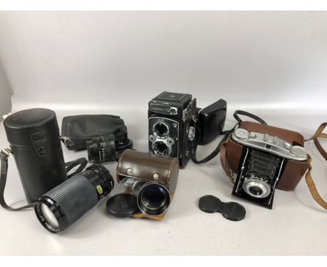 Collection of Vintage camera items to include AGFA ISOLETTE II camera, Yashica - 12 camera with Yashinon Telephoto lens, Auto