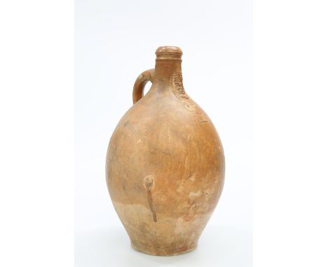 AN 18TH CENTURY STONEWARE BELLARMINE FLAGON,&nbsp;covered in ferruginous glaze, applied with ring-handle, the neck moulded wi