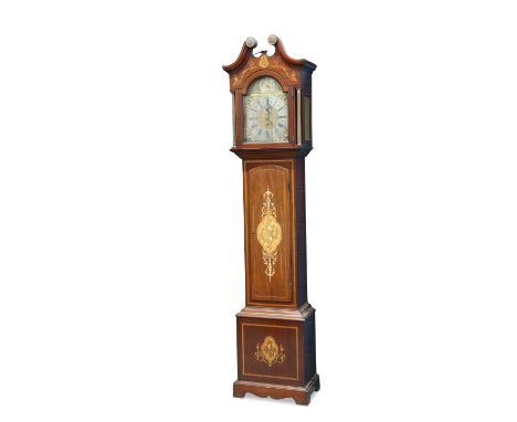 AN EDWARDIAN INLAID MAHOGANY THREE-WEIGHT MUSICAL LONGCASE CLOCK, the hood with swan-neck pediment and free-standing brass Co