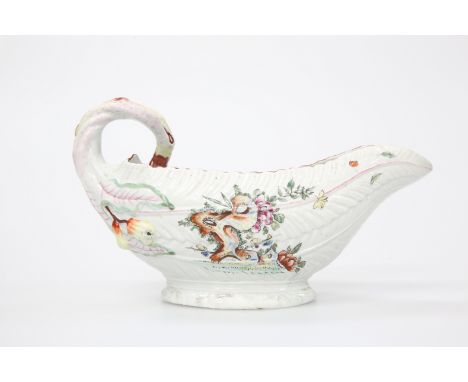 A WORCESTER COS LETTUCE SAUCEBOAT, CIRCA 1755With crisp leaf moulding and curled stalk handles further embossed with flower b