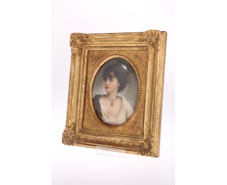 A KPM BERLIN PORCELAIN PLAQUE, CIRCA 1860, oval, painted with a youthful bust portrait, impressed KPM and sceptre mark, in a 