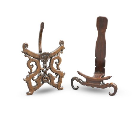 TWO LARGE CHINESE HARDWOOD PLATE STANDS, the first with carved with fish, dragon heads and scrolls, the second with yoked fro
