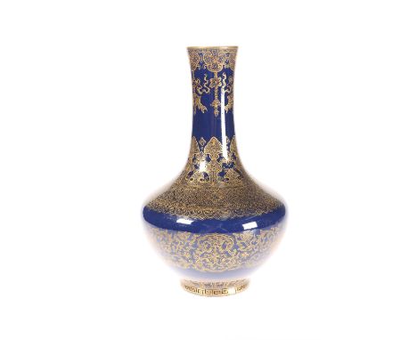 A CHINESE GILT-DECORATED POWDER-BLUE VASE, bottle shaped, decorated with lotus and scrolling foliage, bears blue seal type ma