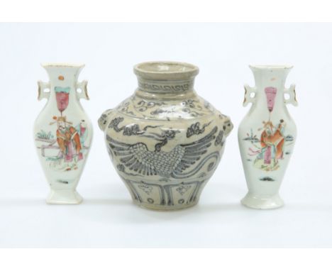 A PAIR OF CHINESE FAMILLE ROSE FLAT-BACK WALL PLAQUES, in the form of vases, each enamel painted with figures, 13.7cm high; a
