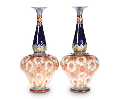 A LARGE PAIR OF DOULTON LAMBETH STONEWARE VASES, the squat bodies issuing a baluster neck with everted rim, the body enamel p