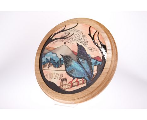 A MOORCROFT POTTERY LIMITED EDITION RSPB WALL PLAQUECircular, tubelined and hand-painted with the Starling Murmurations patte