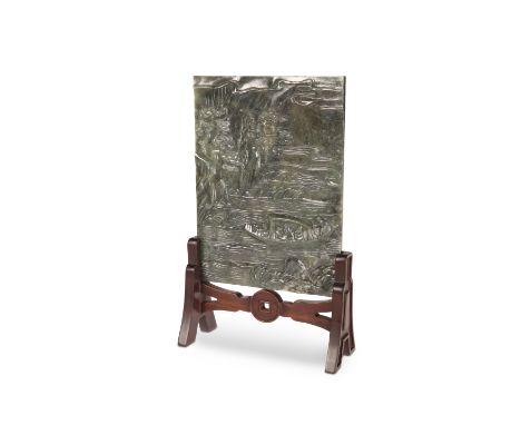 A CHINESE SPINACH-GREEN JADE TABLE SCREEN, decorated in shallow relief with figures in a boat and prunus blossom, the reverse