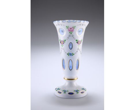 A BOHEMIAN OVERLAY GLASS VASE, LAST QUARTER OF 19TH CENTURYThe white cut-through to blue with circles and ovals, enamel paint