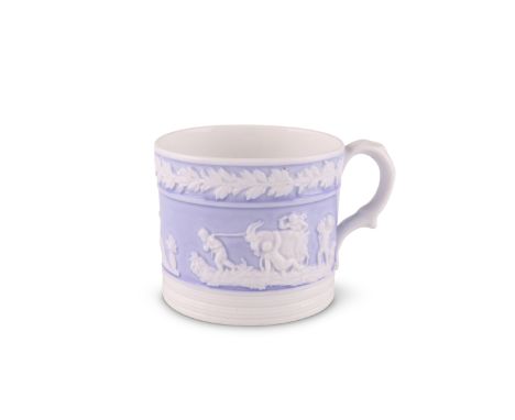 A NEW HALL BONE CHINA MUG AND JUGcirca 1820-25The lilac grounds with sprigged scenes of putti. (2)Mug 6.4cm high. Jug 7cm hig