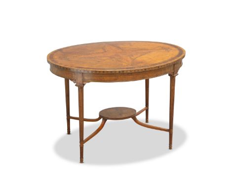 AN INLAID SATINWOOD CENTRE TABLE, CIRCA 1890,&nbsp;the quarter-veneered oval top decorated with ribbon-tied bell-flower swags