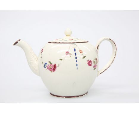 A LATE 18TH CENTURY CREAMWARE TEAPOT AND COVEROf globular form, polychrome enamel painted with floral swags, the cover with p