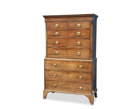 A GEORGE III MAHOGANY CHEST ON CHEST, the upper section with two short over three long graduated drawers, flanked by canted c