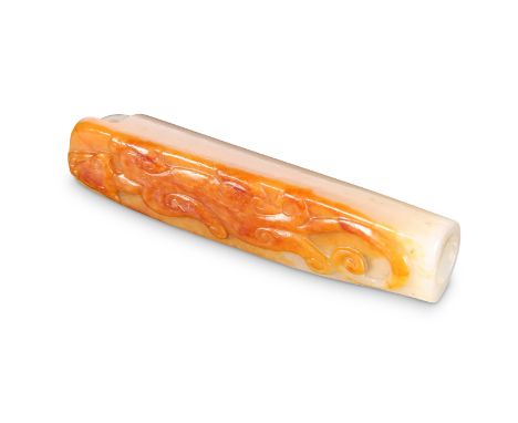A CHINESE JADE FEATHER HOLDER, decorated in low relief with chilong. 7.5cm long