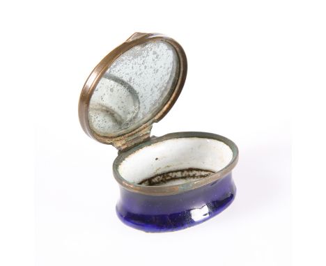 A BILSTON BLUE COBALT ENAMEL PATCH BOX, 18TH CENTURYOval, the hinged lid with mirror to the underside. 4.3cm wide