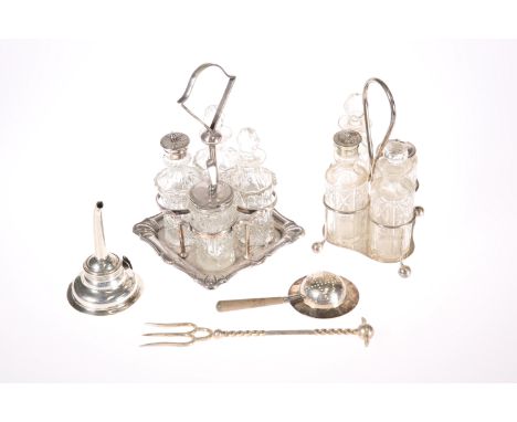 TWO SILVER PLATE ON COPPER CRUET STANDS,&nbsp;each complete with four matching cut-glass condiment bottles; together with a s