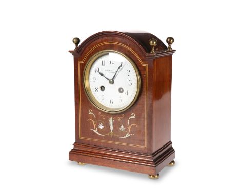 AN EDWARDIAN INLAID MAHOGANY MANTEL CLOCK, SIGNED COLLINGWOOD &amp; SON, STOCKTON ON TEES, the case with arch top and four br