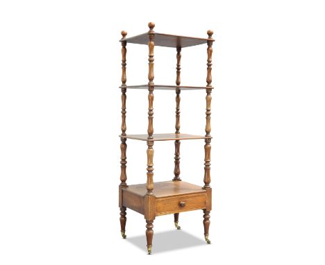 A 19TH CENTURY MAHOGANY WHATNOT, the three rectangular shelves with rounded corners, supported on baluster uprights, issuing 