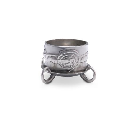 ARCHIBALD KNOX (1864-1933)A LIBERTY & CO TUDRIC PEWTER FERNER BOWL, NO. 0288, circular with four ring feet, cast in low relie