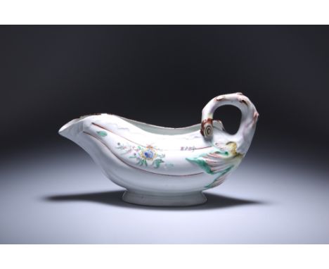 A VERY RARE WORCESTER PORCELAIN POLYCHROME LEAF SAUCE BOAT WITH CONJOINED LIP, CIRCA 1755Leaf moulded and with stalk handle, 