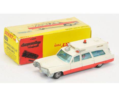 Dinky Toys 288 Superior Cadillac Ambulance, red lower, cream upper, with stretcher, Excellent, also includes box for Dinky To