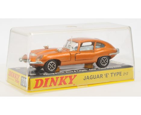 Dinky Toys 131 Jaguar 'E' Type, metallic bronze, pale blue interior, white plastic aerial, chrome trim, cast wire wheels, con