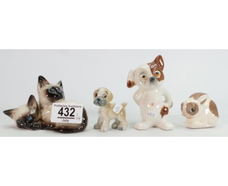 A collection ceramic animals to include: Cats Dogs and Rabbits(4)
