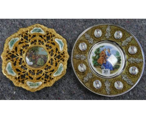 Two Mid century italian style brass wallplaques: decorated with ceramic panel with portraits. (2)