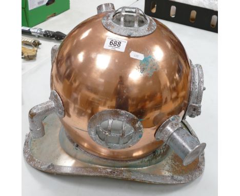 A large reproduction brass and copper divers helmet: height 41cm