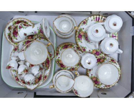 A collection of Royal Albert Old Country Roses dinner and tea ware: including large and small cups &amp; saucers, egg cups, v