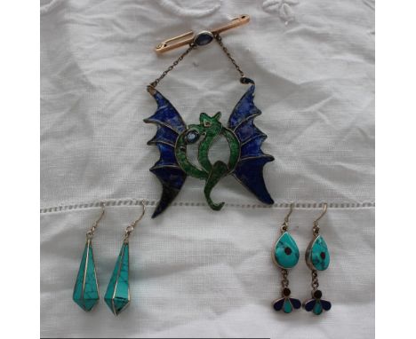 Two pairs of enamel decorated earrings and an enamel decorated brooch in the form of a dragon marked "9ct gold"