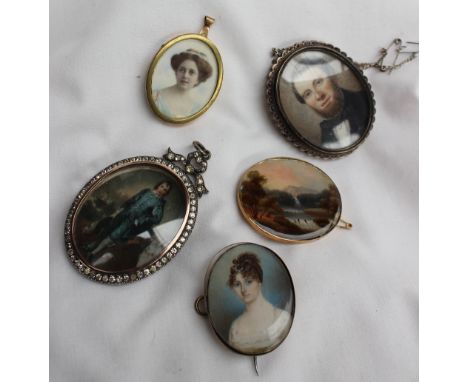 19th century British SchoolHead and shoulders portrait of a ladyWatercolour on ivory4 x 3cmSet into a locket Together with a 