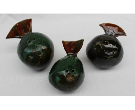 A set of three John Hughes pottery bird money boxes, of globe shape decorated in greens and browns, initialled,  CONDITION RE