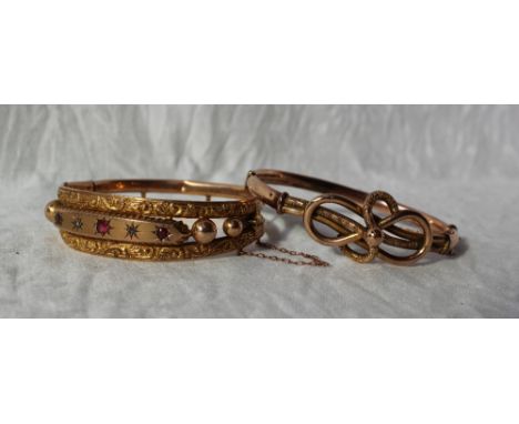 A 9ct yellow gold hinged bangle,  set with diamonds and semi precious stones, together with another hinged bangle, approximat