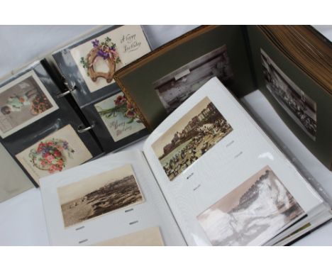 Two postcard albums, including circa 240 postcards depicting portrait cards, soldiers, Birthday cards, comic cards, Mabel Luc